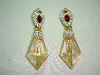 Signed Swarovski Red and Clear Crystal Dangle Gold Clip On Earrings 